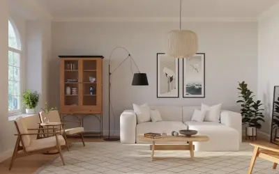 Ein Wohnzimmer im skandinavischen Design-Stil mit beiger Couch, Holzboden und einem Schrank.