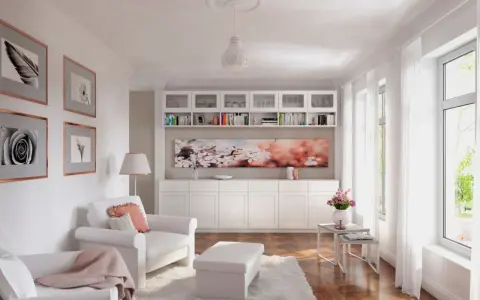 Ein helles Wohnzimmer mit weißem Sofa, Sessel, Bücherregal und Kirschblüten-Kunstwerk. Modernes **interior design** mit viel Licht.